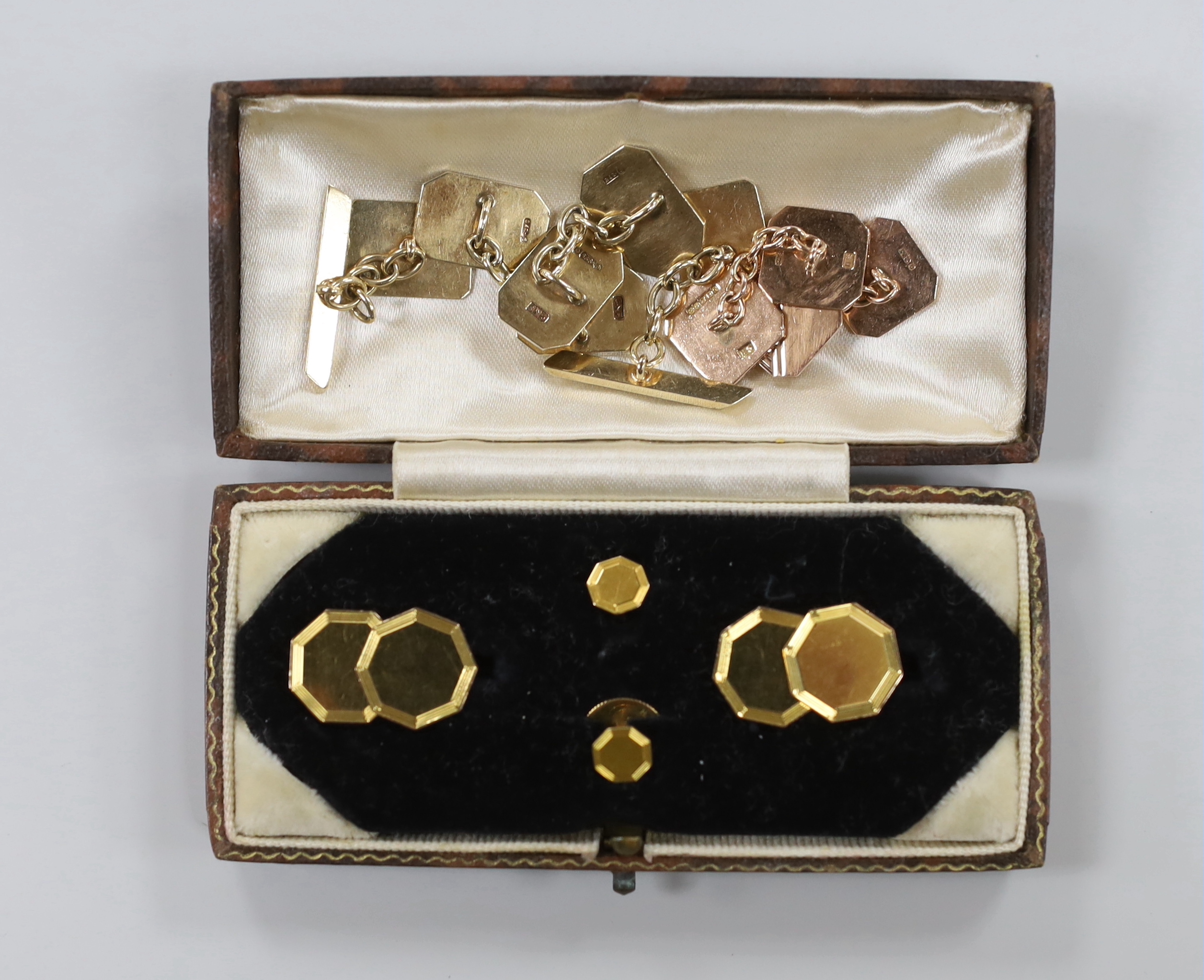 A cased 9ct gold four piece dress stud set including pair or cufflinks and three other pairs of yellow metal cufflinks (two pairs 9ct gold), gross weight 24 grams.